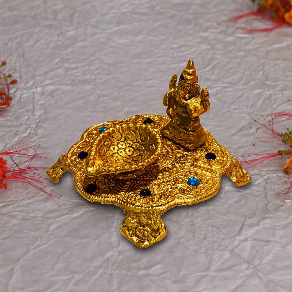 Golden Finish Metal Ganesha Idol With Deepak
